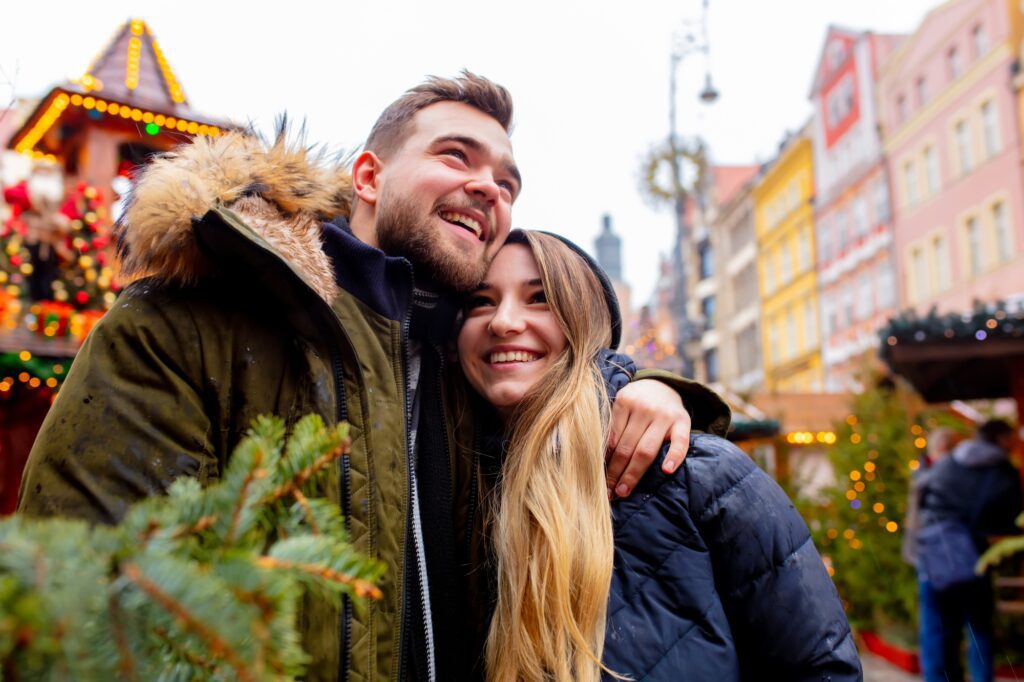 Young couple in Christmas market